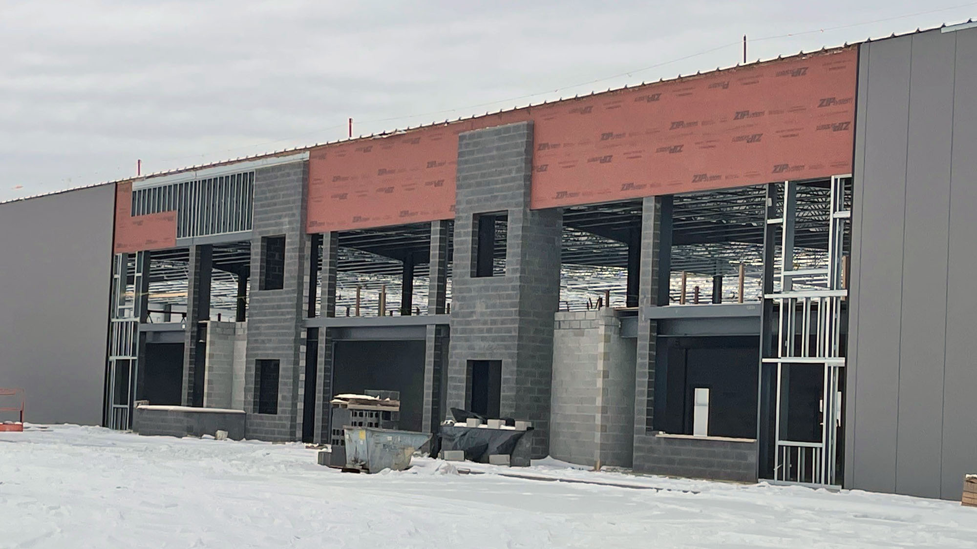 Front of the Trim-Lok midwest building entrance under construction